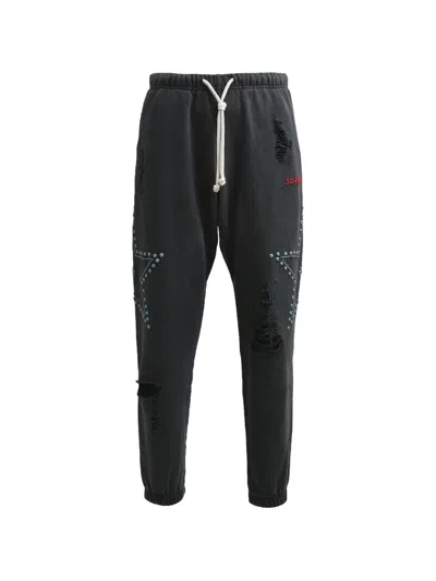 Satoshi Nakamoto Distressed Star-studded Track Pants In Black