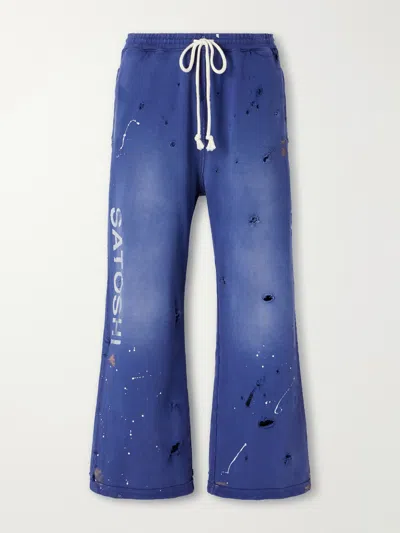 Satoshi Nakamoto Luke Logo-printed Paint-splattered Distressed Cotton-jersey Drawstring Sweatpants In Blue