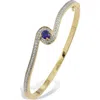 Savvy Cie Jewels Birthstone Two-tone Bangle Bracelet In Yellow - February