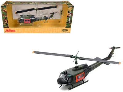 Schuco Bell Uh 1d Helicopter "sar - German Army" Green Camouflage 1/87 (ho) Scale Diecast Model Car By Schu