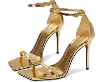 Schutz Jenna Heel In Ouro Claro Orch In Multi