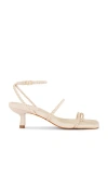 Schutz Kaya Braided Leather Mid-heel Sandals In Cream