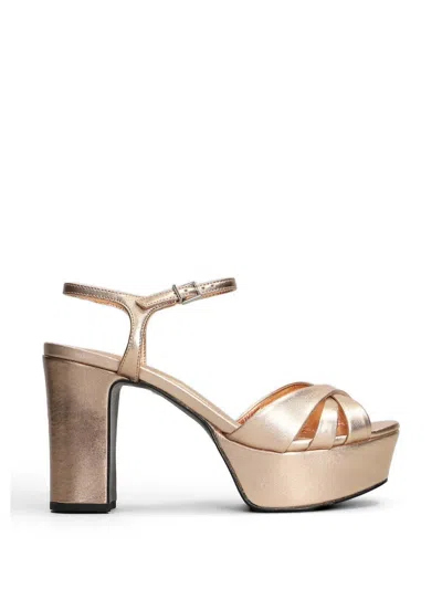 Schutz Metallic Crossover Sandals In Pink