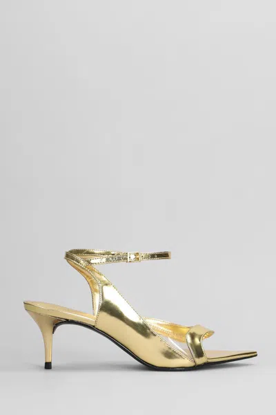 Schutz Sandals In Gold