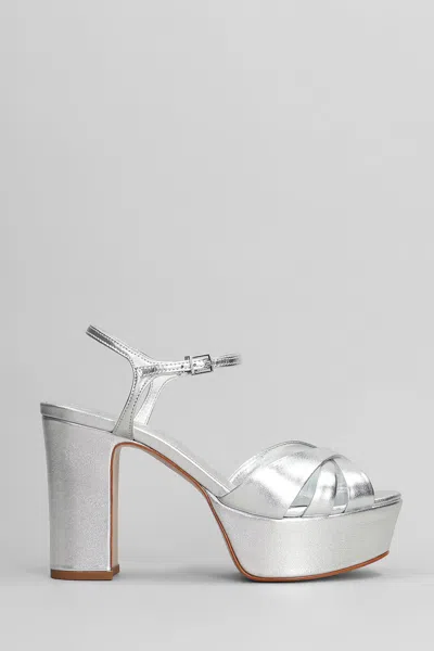 Schutz Sandals In Silver Leather