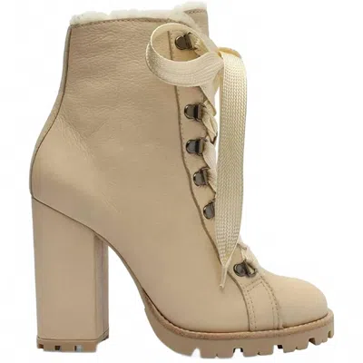 Schutz Women Faux Fur Lining Lug Sole Winter Leather Booties In Beige In Neutral