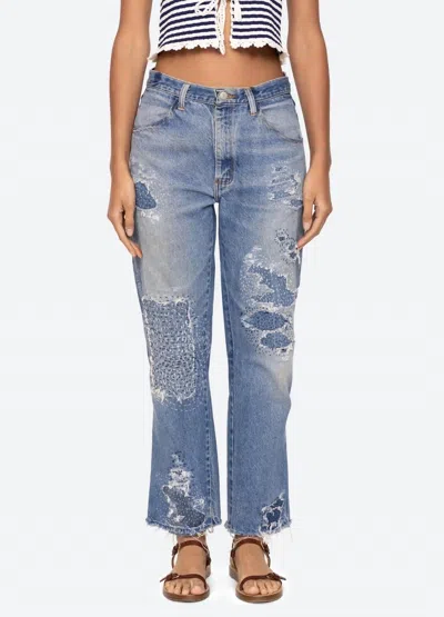 Sea Oli Distressed Mid-rise Jean In Blue