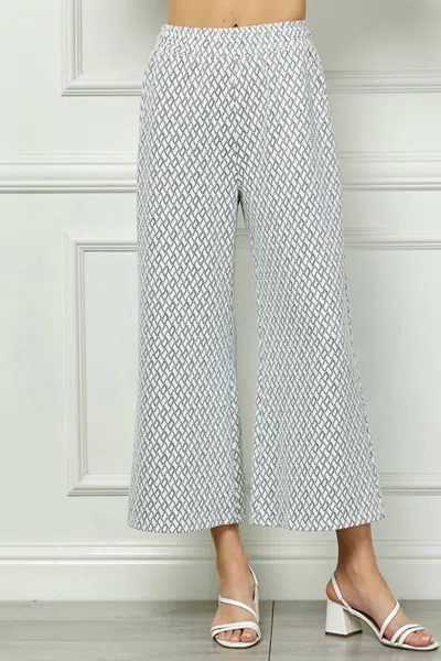 See And Be Seen Metallic Jacquard Cropped Pants In White In Black