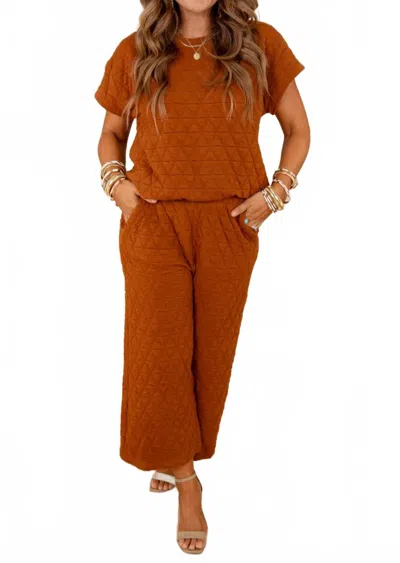 See And Be Seen Quilted Cropped Set In Rust In Transparent