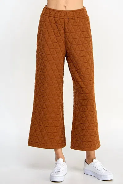 See And Be Seen Quilted Luxe Pants In Rust In Brown