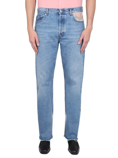 Séfr Light-wash Jeans With Distressed Hem In Blue