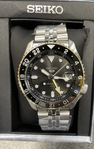 Pre-owned Seiko 5 Automatic Gmt Steel Band Black Dial Gold Bezel Watch Ssk021 Japan Made
