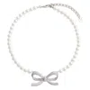Self-portrait Lustrous Pearl Necklace With Bow-shaped Pendant In Metallic