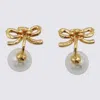 Self-portrait Bow Design Pearl Embellished Earrings In Gold