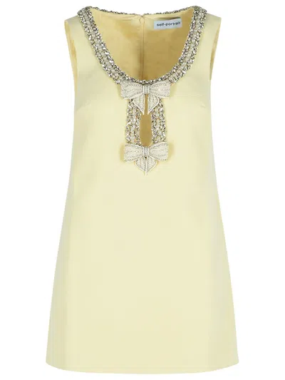 Self-portrait Yellow Crewneck Mini Dress With Jewel Embellishment On The Collar And Bow Detail On The Front In Nude