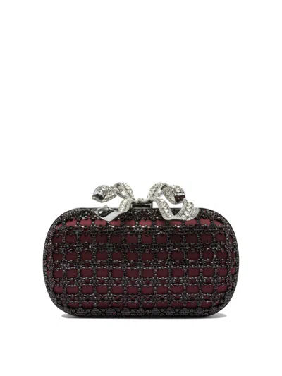 Self-portrait Clutches