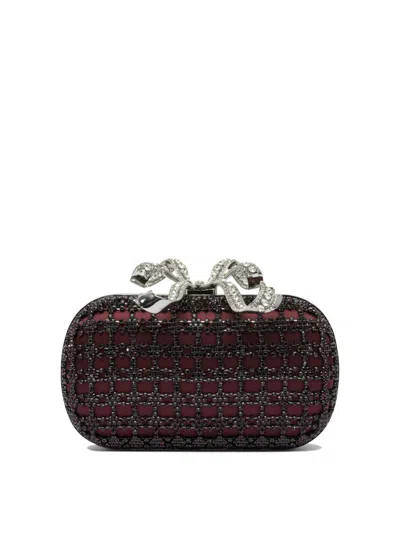 Self-portrait Clutches