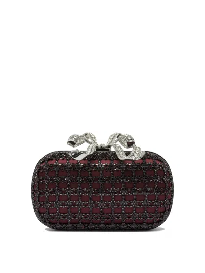 Self-portrait Clutches