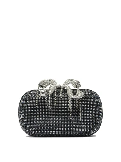 Self-portrait Clutches