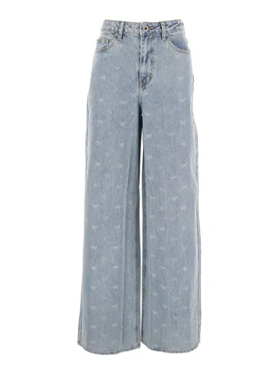 SELF-PORTRAIT BLUE JEANS WITH LOGO PATCH ON THE REAR AND ALL-OVER CRYSTAL BOWS EMBELLISHMENT IN DENIM WOMAN