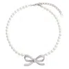 Self-portrait Lustrous Pearl Necklace With Bow-shaped Pendant In Metallic