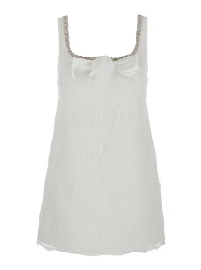 SELF-PORTRAIT WHITE MINI DRESS WITH SQUARE NECK AND BOW DETAIL ON THE FRONT IN TECH FABRIC WOMAN