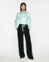 Serena Bute Velvet Jogger In Green