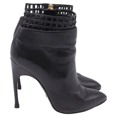 Sergio Rossi Lattice Cut Out Accent Ankle Boots In Black Leather