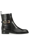 Sergio Rossi Round Toe Ankle Boots With Gold Hardware In Schwarz