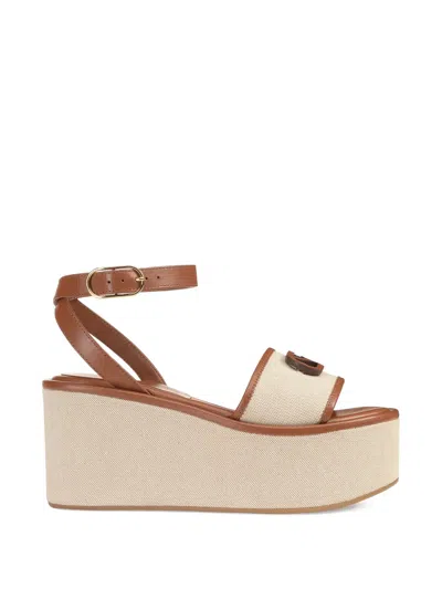 Sergio Rossi Surge Logo Platform Sandals In Brown