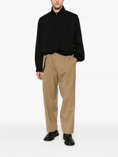 Seven Gauge Pleated Belted Trousers In Black