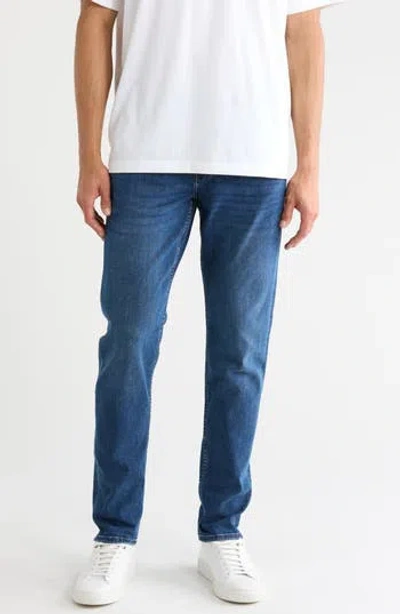 Seven Slimmy Tapered Jeans In Blue