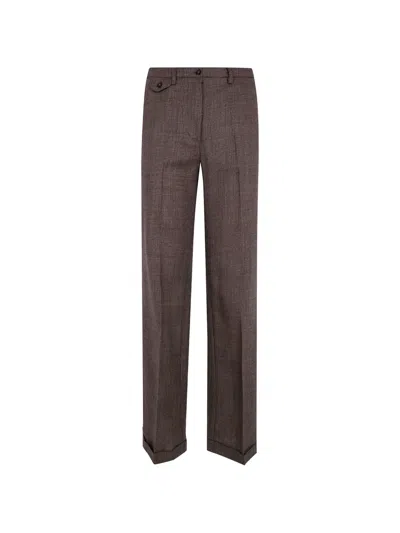 SEVENTY HOUNDSTOOTH-PATTERN WOOL TROUSERS