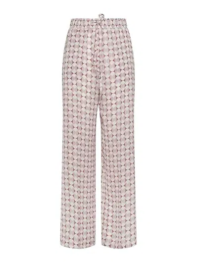 SEVENTY PRINTED TROUSERS