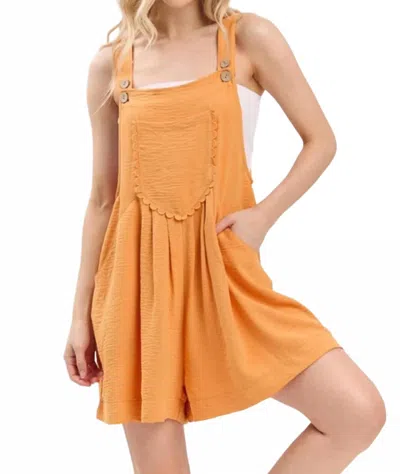 Sewn And Seen Scallop Pocket Romper In Orange