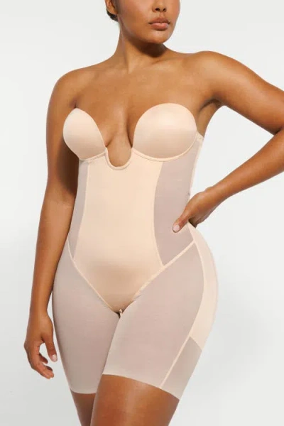 Shapellx Deep Plunge Butt Lifting Shaping Bodysuit In Pinkish Beige
