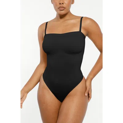 Shapellx Skin Flow Strapless Sculpt Thong Bodysuit In Black