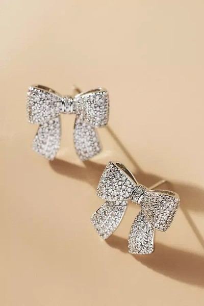 Shashi Petite Pavé Bow Earrings In Metallic