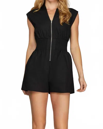 She + Sky Cap Sleeve Woven Smocked Waist Front Zip Romper In Black