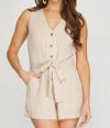 SHE + SKY SLEEVELESS V NECK LINEN BUTTON DOWN ROMPER WITH WAIST TIE IN NATURAL