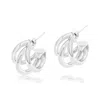 Shymi Women's Claw Hoop Earrings - Silver In White