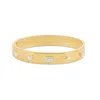 Shymi Women's Wide Fancy Shape Bangle - Gold In Gold