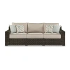 Signature Design By Ashley Coastline Bay Outdoor Sofa With Cushions In Brown