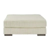 Signature Design By Ashley Lindyn Cushioned Upholstered Ottoman In Sand