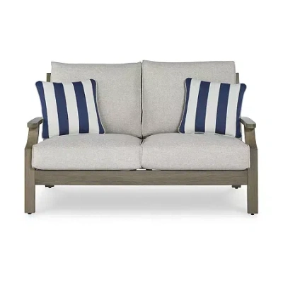 Signature Design By Ashley Raleigh Ranch Outdoor Loveseat With Cushion In Brown