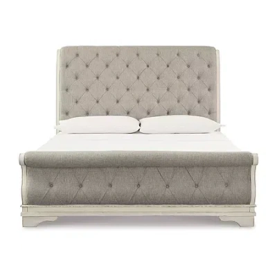 Signature Design By Ashley Realyn Upholstered Sleigh Bed In Chipped White In Sand