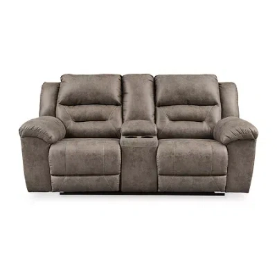 Signature Design By Ashley Stoneland Manual Reclining Loveseat With Console In Brown