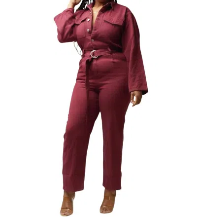 Signature8 Belted Long Sleeve Jumpsuit In Burgundy In Brown