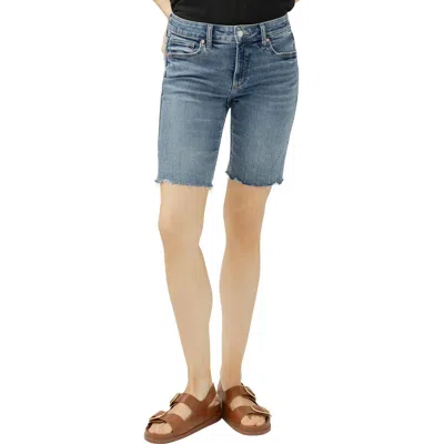 Silver Jeans Co. Elyse Curvy Raw Hem Mid Rise Denim Bermuda Shorts In Blue