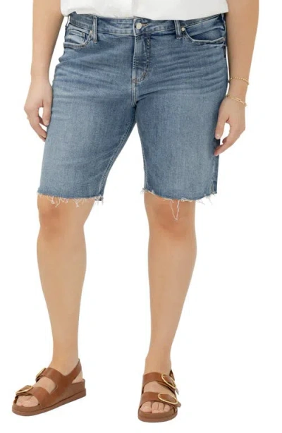 Silver Jeans Co. Elyse Curvy Raw Hem Mid Rise Denim Bermuda Shorts In Blue